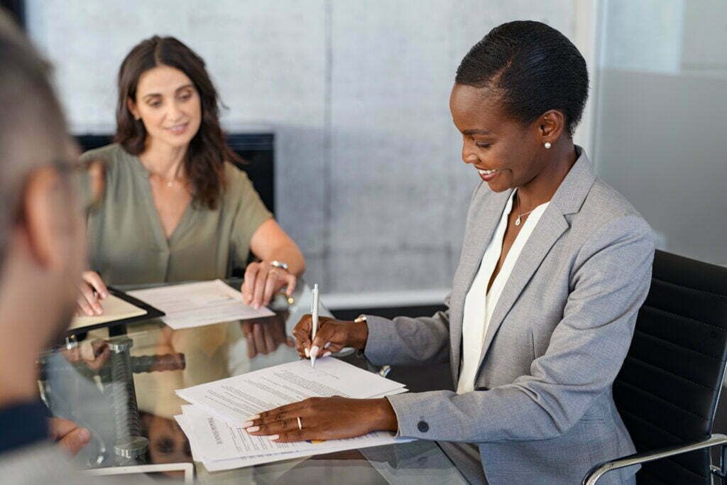 african businesswoman signing document during meet 2022 09 08 19 21 11 utc