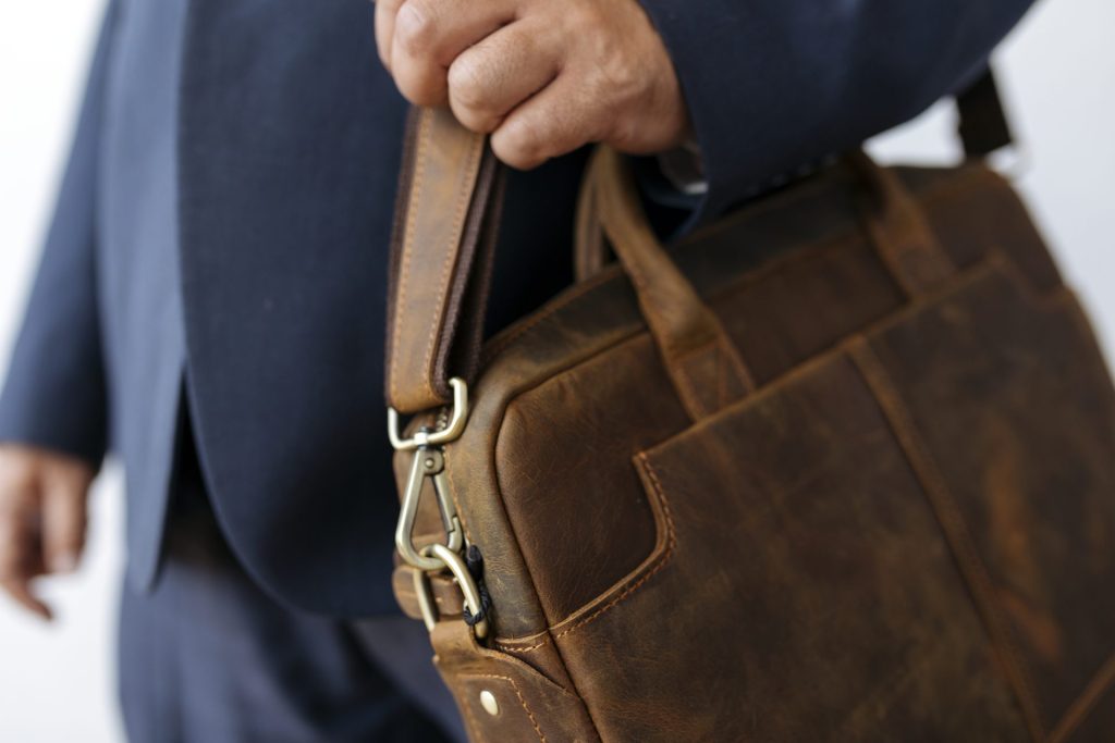 man carrying a briefcase 2022 12 16 01 16 20 utc