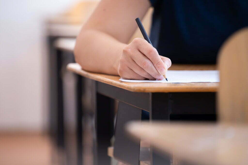 student writing final exam in classroom 2021 09 04 13 08 14 utc